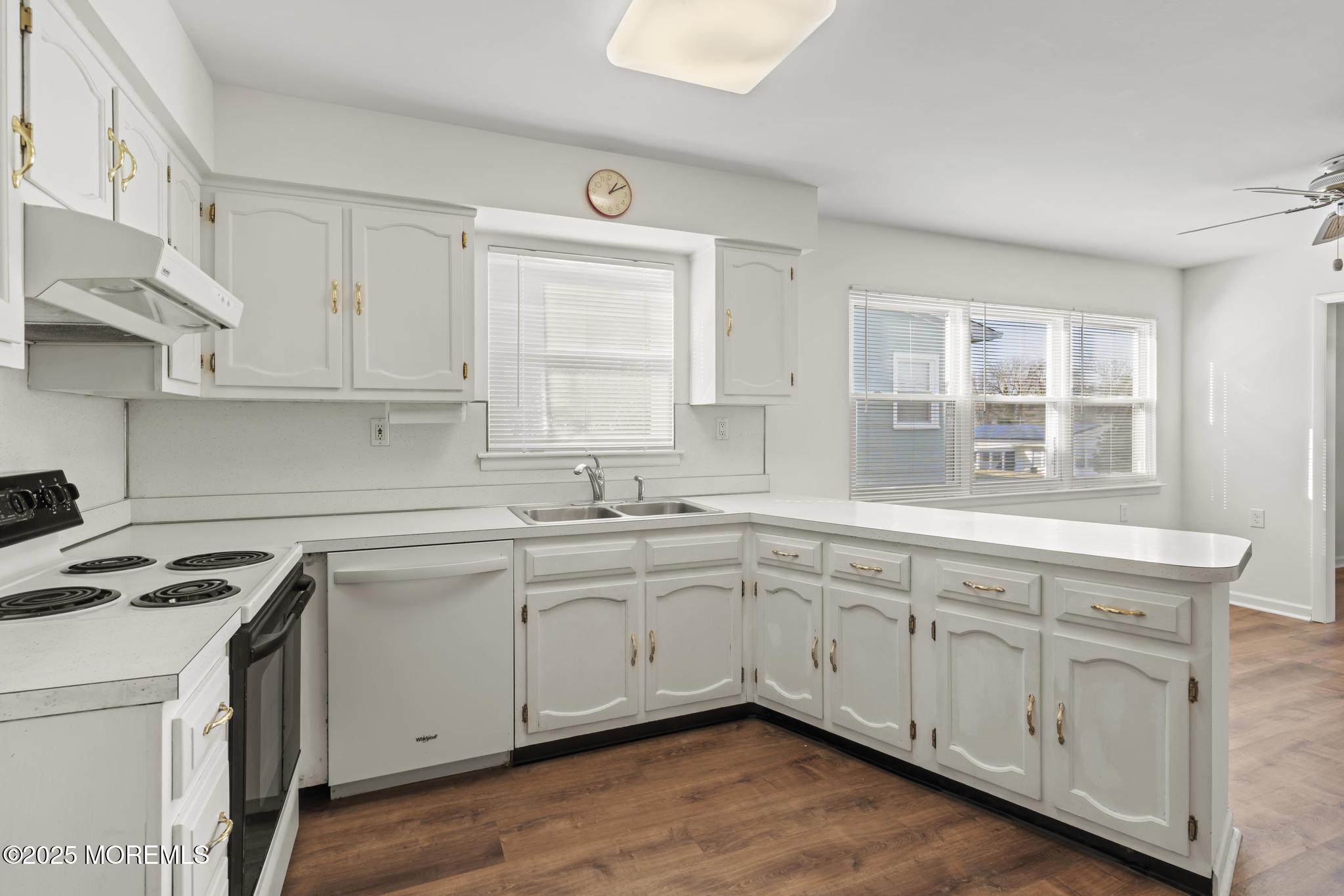 43 Patmore Road Brick, NJ 08724 - Photo 5 of 36 a kitchen with sink cabinets and window