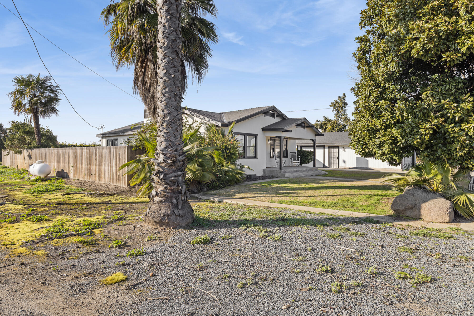 29205 Road 210 Exeter, CA 93221 - Photo 6 of 44 a front view of a house with swimming pool
