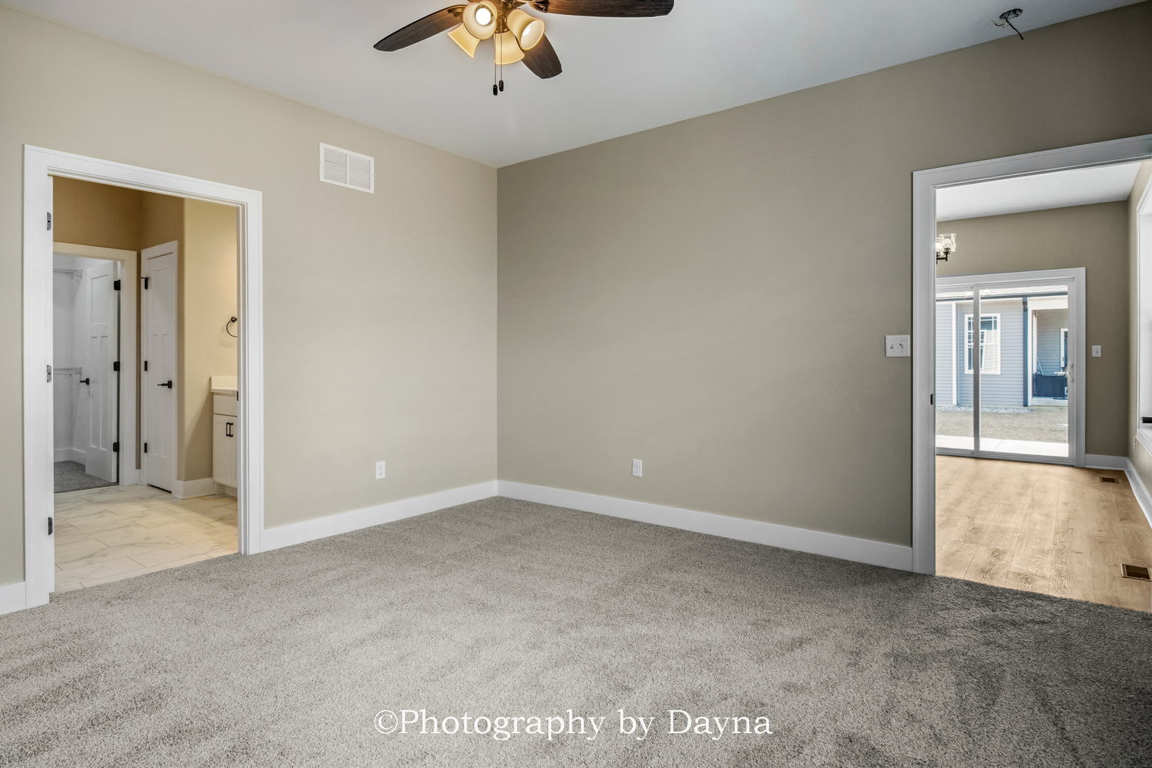 392 White Hawk Way Manteno, IL 60950 - Photo 12 of 25 an empty room with fan and windows