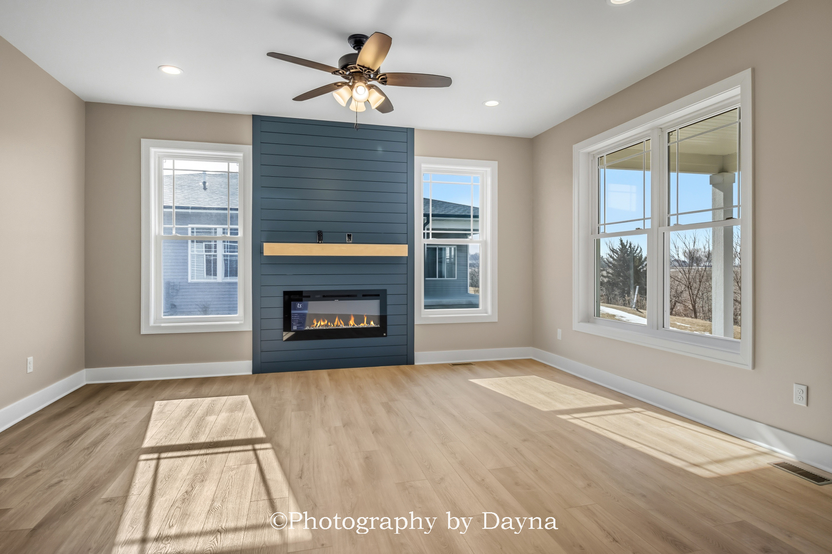 392 White Hawk Way Manteno, IL 60950 - Photo 7 of 25 a view of an empty room with a window and fireplace