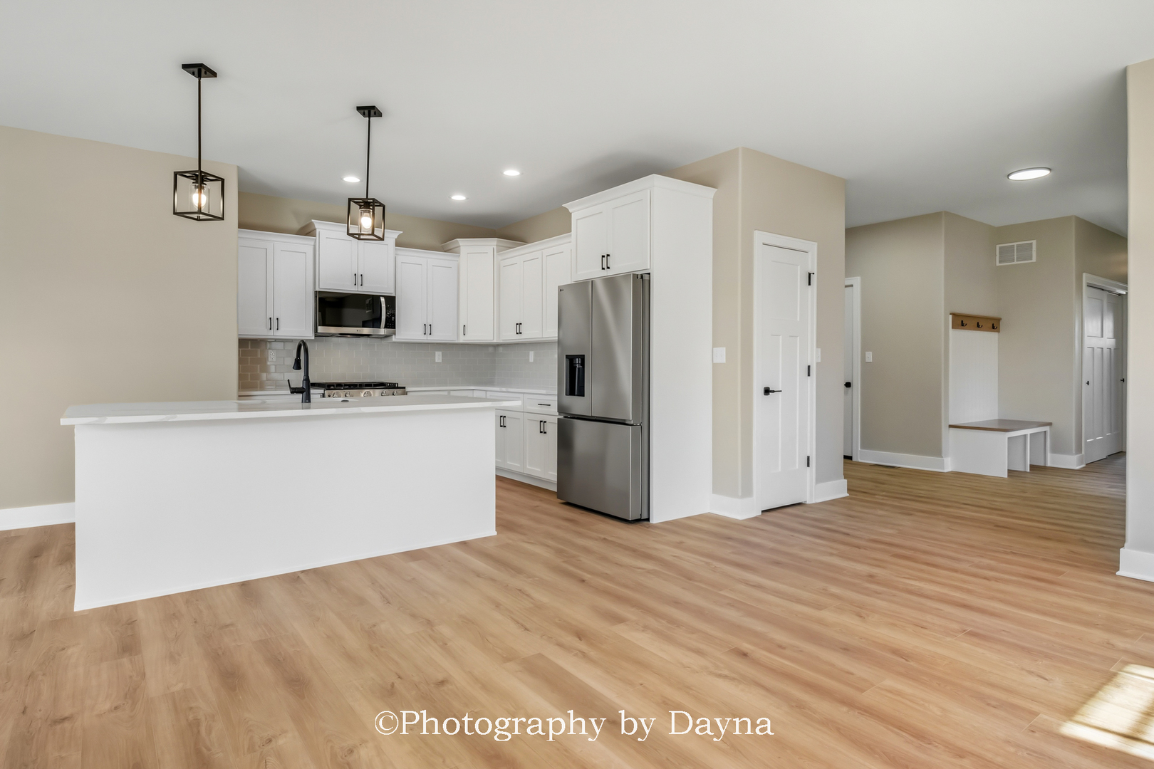 392 White Hawk Way Manteno, IL 60950 - Photo 9 of 25 a kitchen with stainless steel appliances a refrigerator sink and microwave