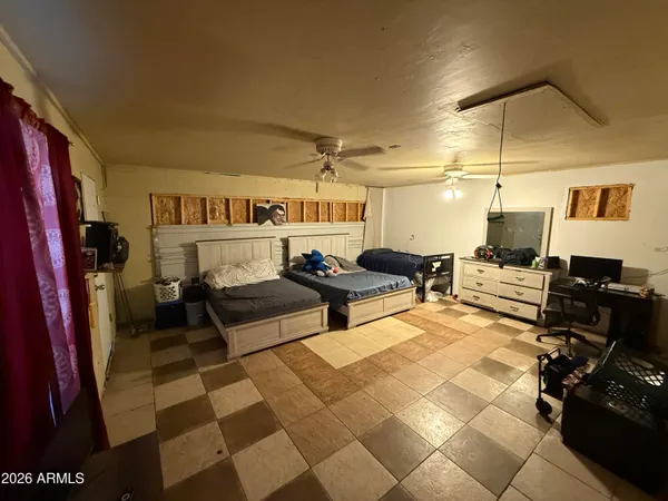 a living room with lots of furniture and a rug