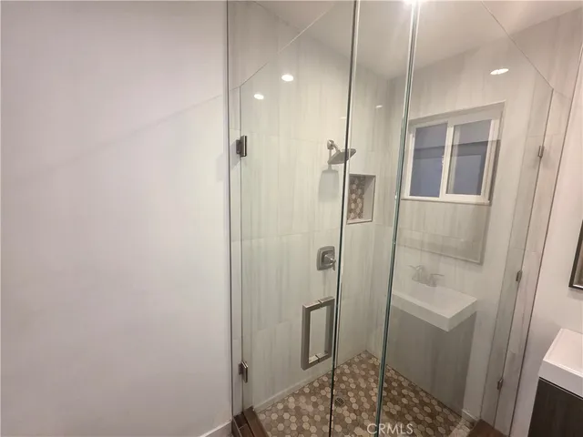 a bathroom with a sink and toilet