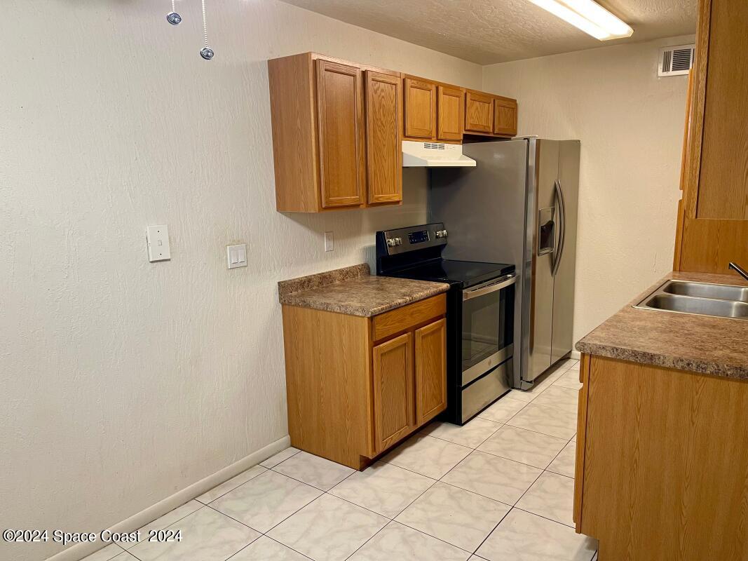 3923 Tree Ridge Lane Northeast Palm Bay, FL 32905 - Photo 4 of 6 4