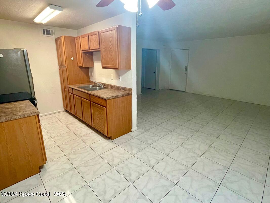 3923 Tree Ridge Lane Northeast Palm Bay, FL 32905 - Photo 5 of 6 5