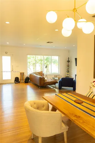 a view of a living room and bathroom