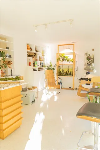a view of a living room and chandelier
