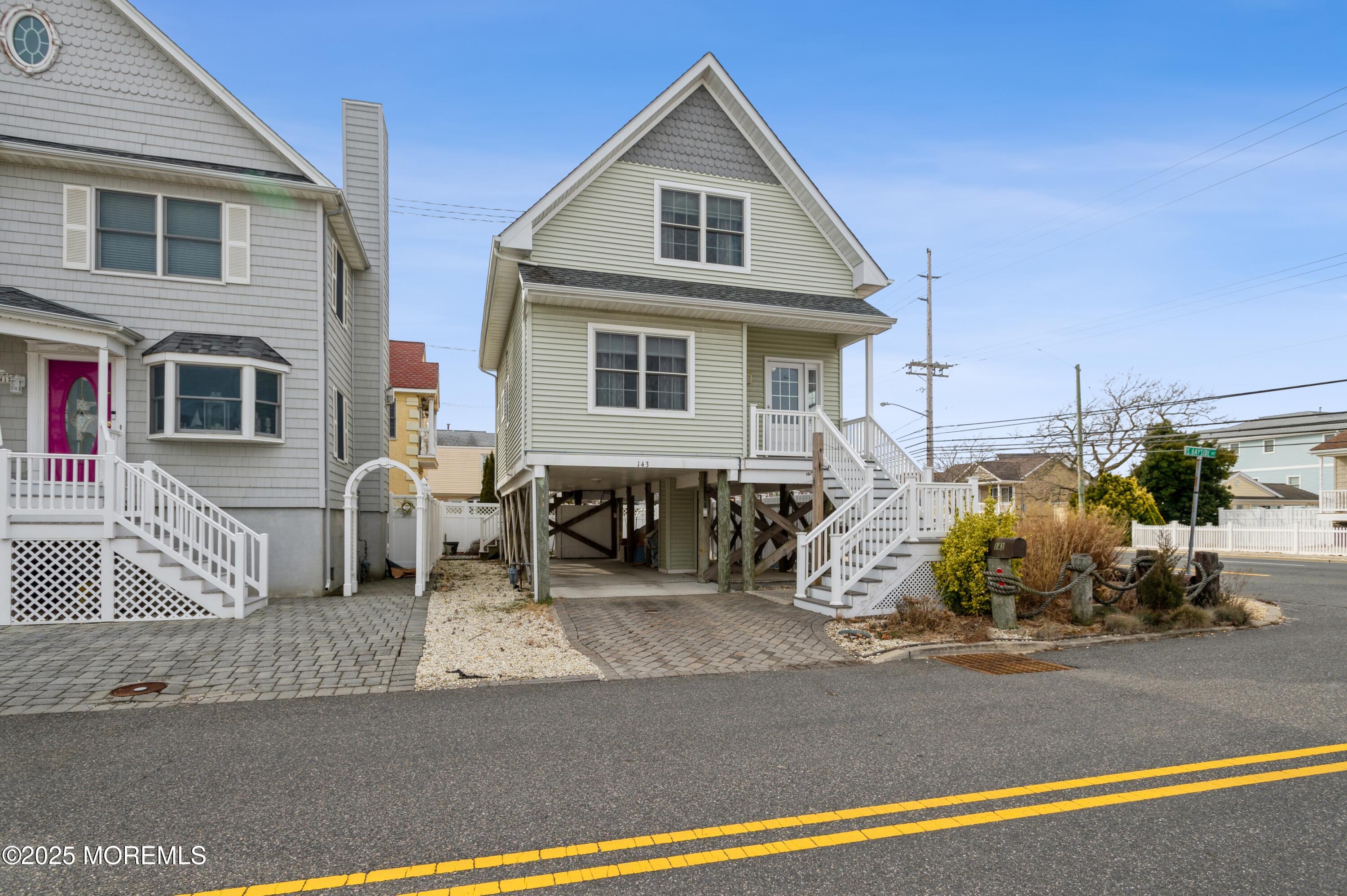 143 North Bayside Road Lavallette, NJ 08735 - Photo 1 of 23 01_143SBaysideRd_57_FrontView_HiRes