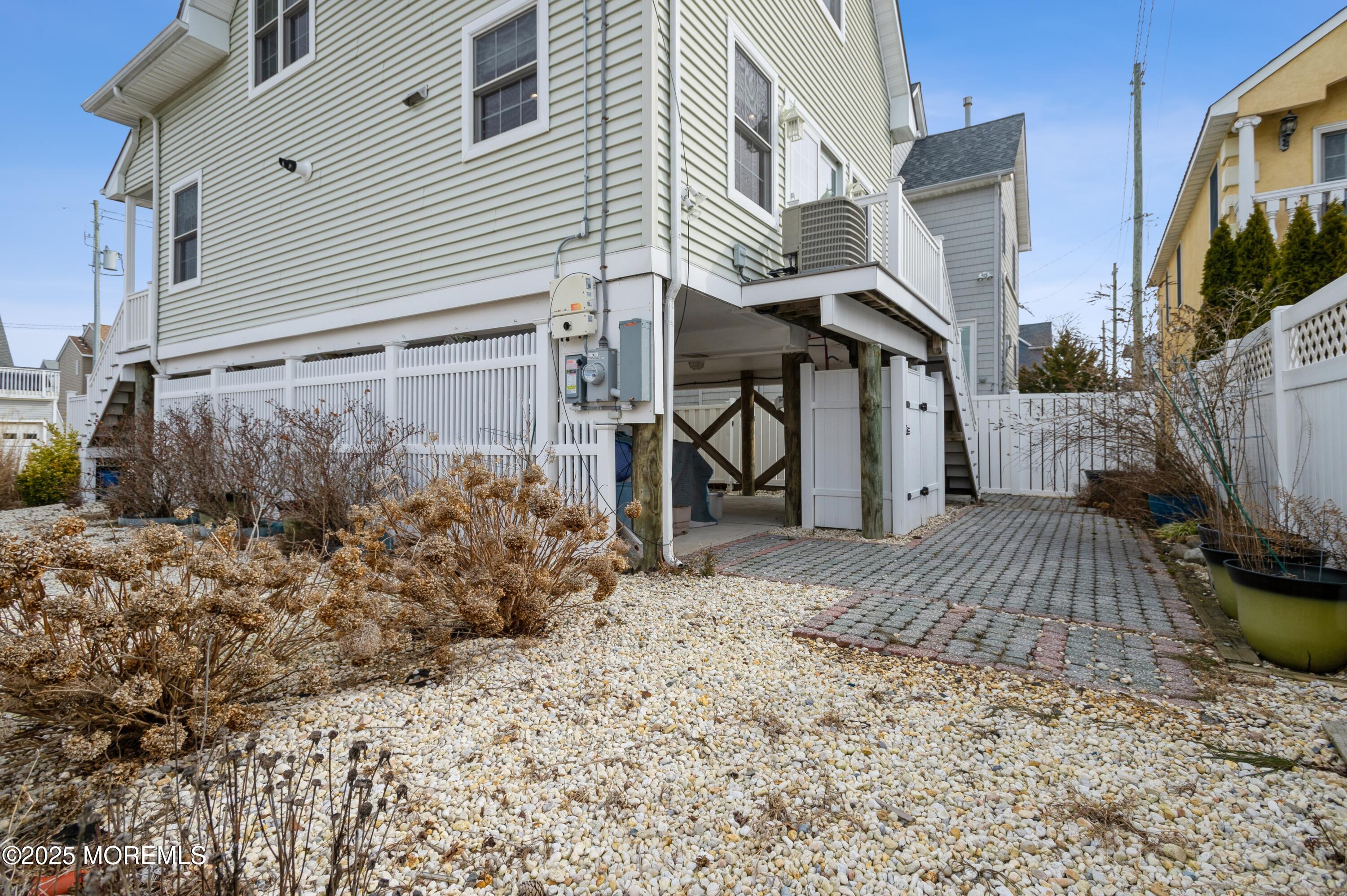 143 North Bayside Road Lavallette, NJ 08735 - Photo 16 of 23 a view of a house with a yard