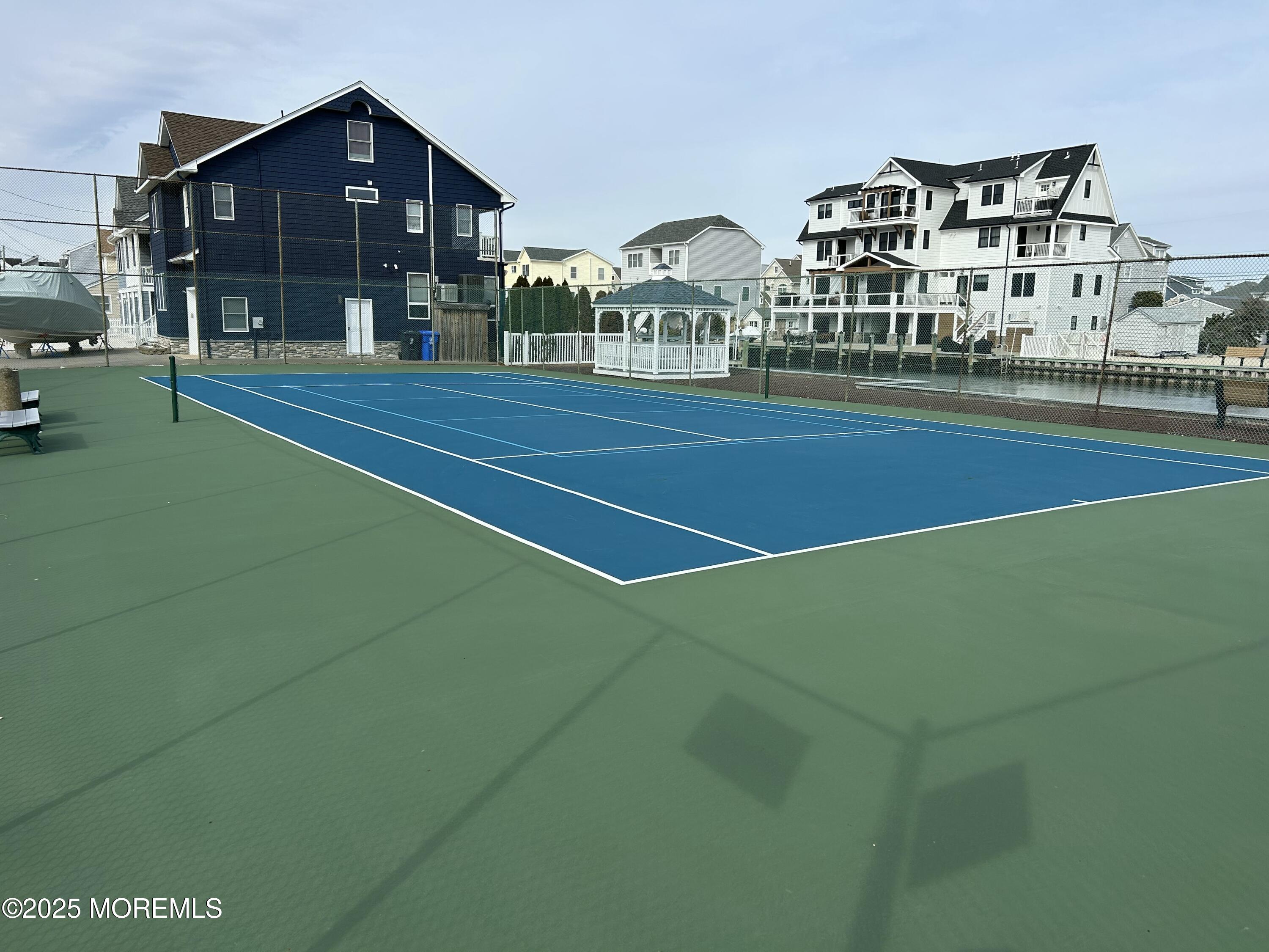 143 North Bayside Road Lavallette, NJ 08735 - Photo 19 of 23 a front view of building with yard and green space