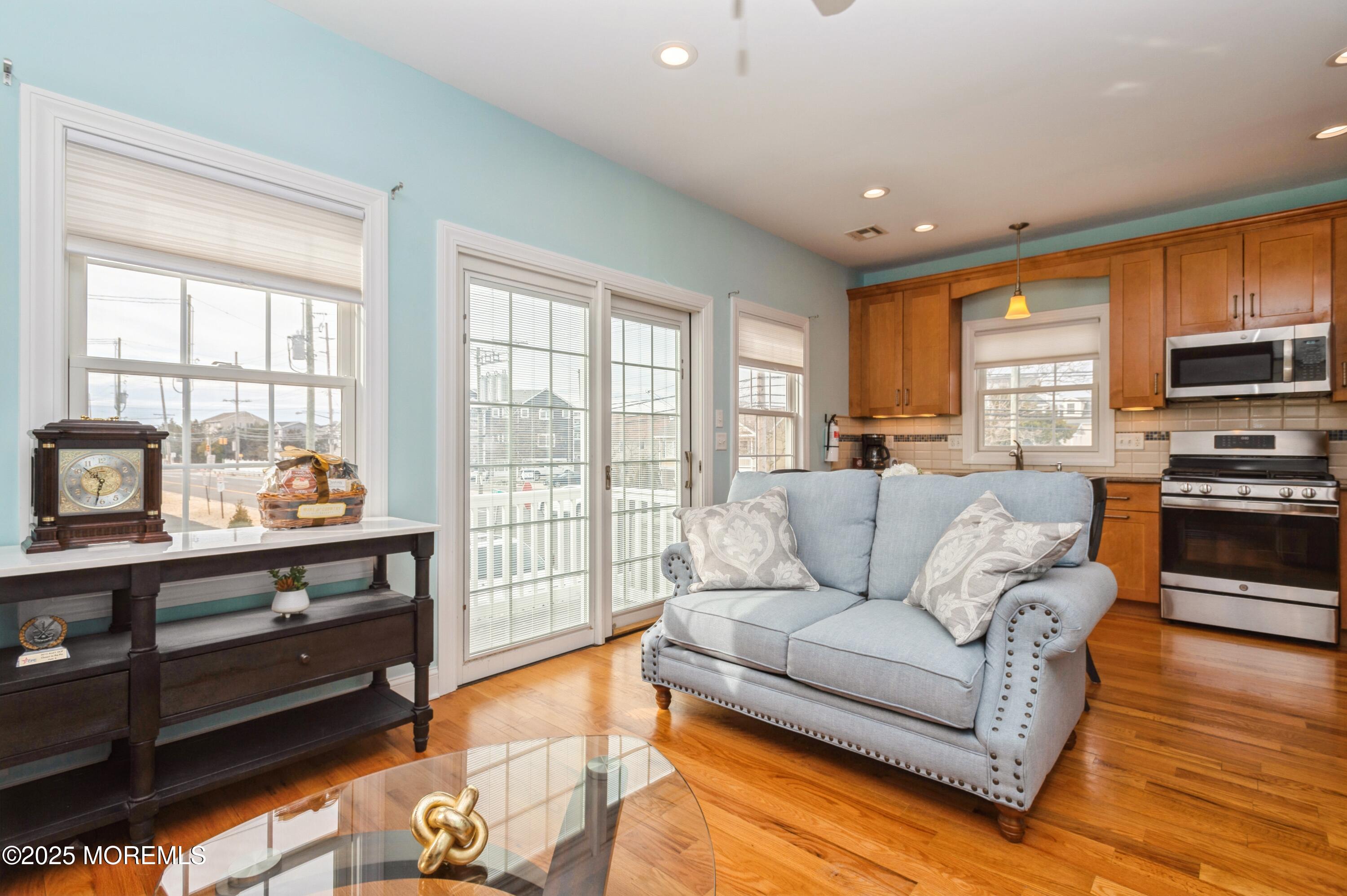 143 North Bayside Road Lavallette, NJ 08735 - Photo 4 of 23 a living room with furniture and a flat screen tv