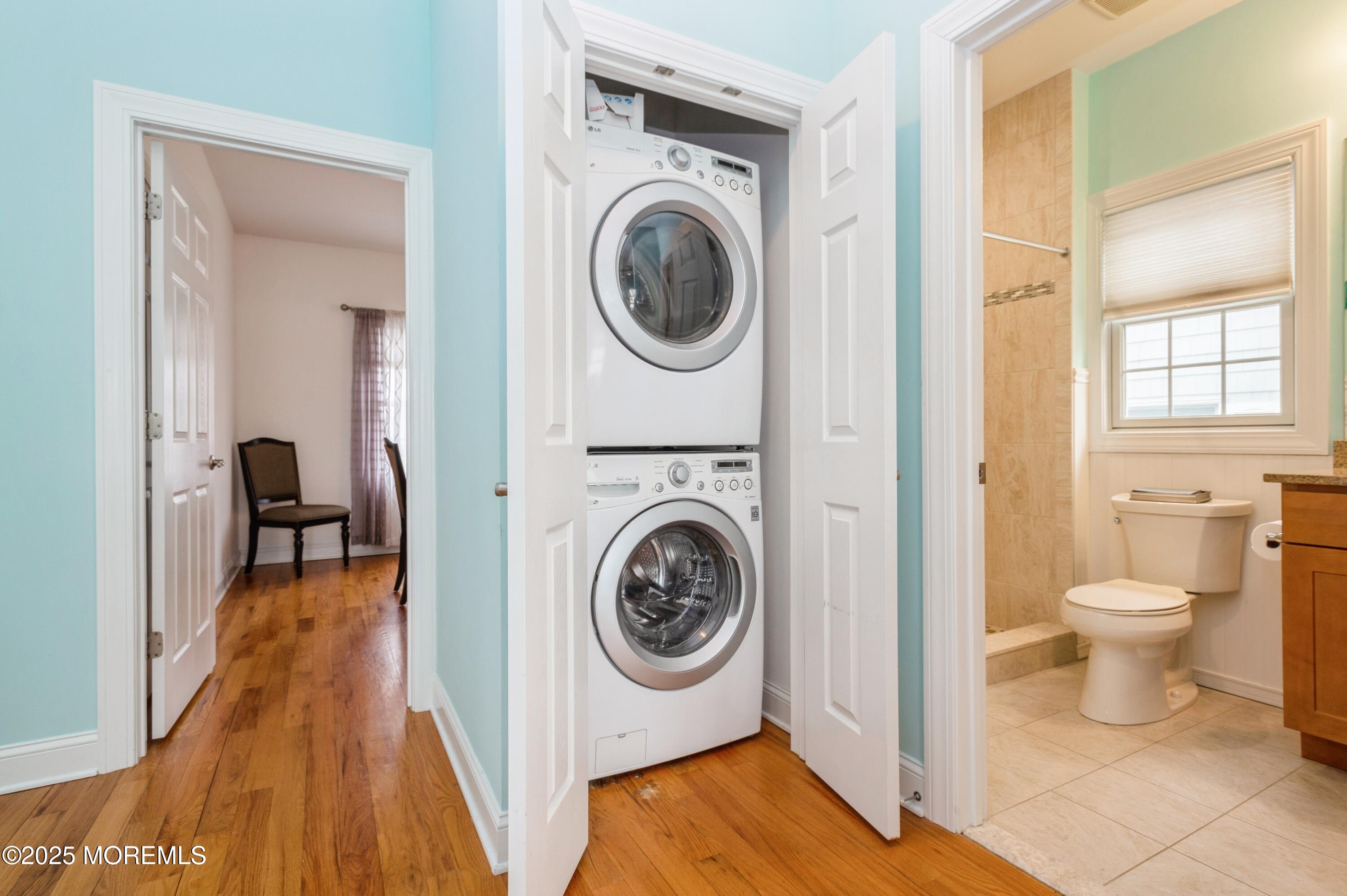 143 North Bayside Road Lavallette, NJ 08735 - Photo 8 of 23 a view of a bedroom with washer and dryer