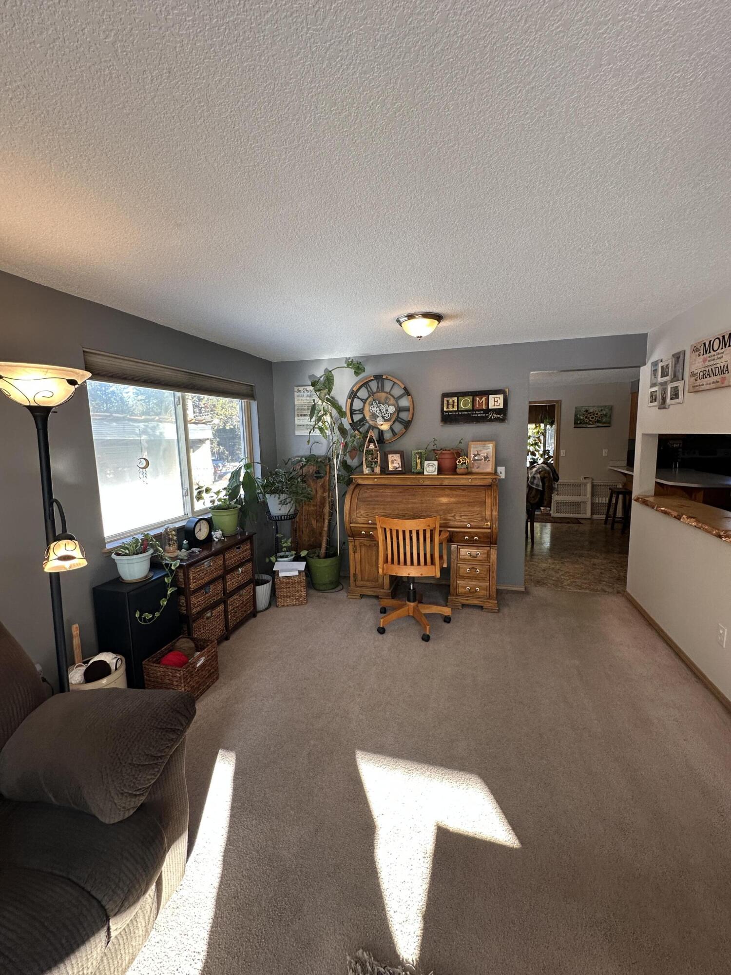 123977 Surveyor Road Crescent Lake, OR 97733 - Photo 14 of 41 a living room with furniture and a flat screen tv