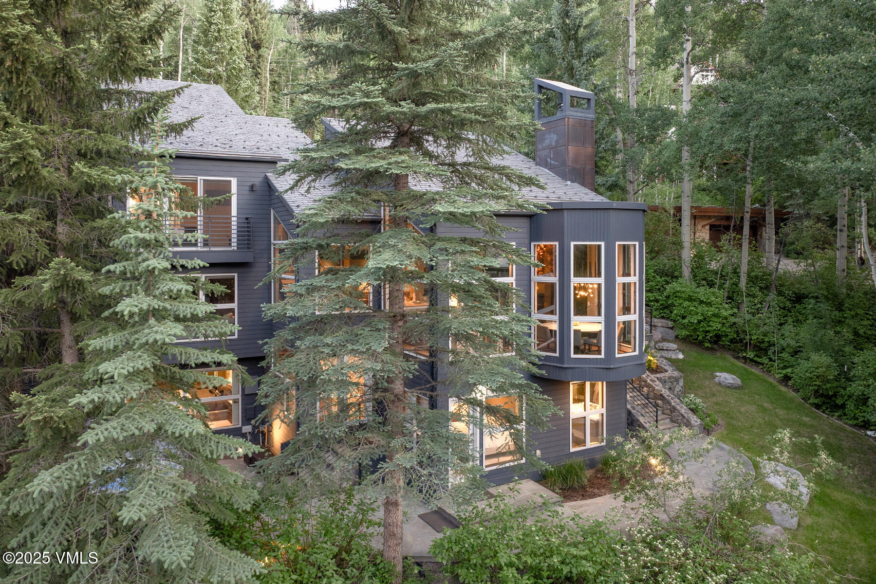 a front view of a house with yard