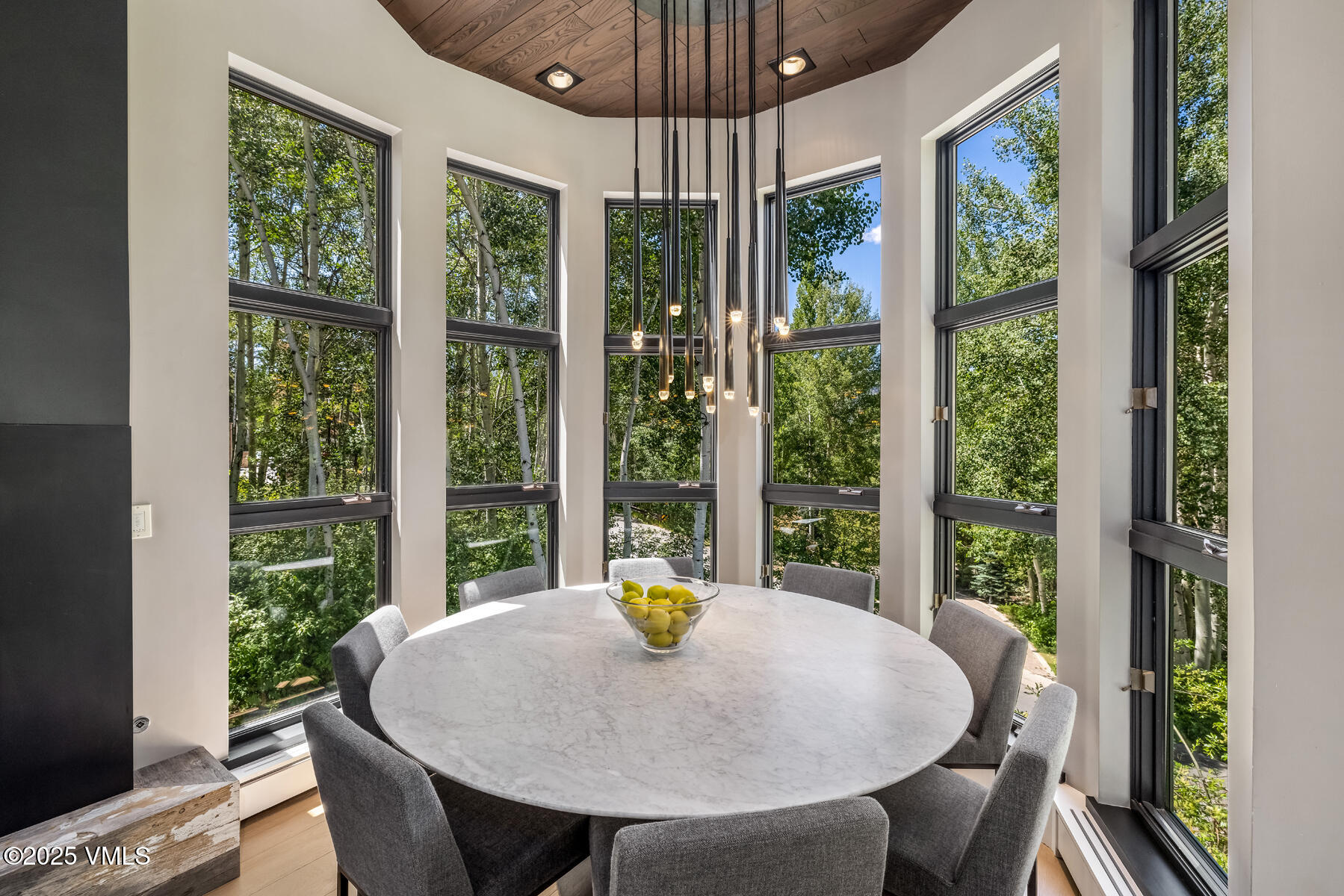 327 Rockledge Road, Unit W Vail, CO 81657 - Photo 5 of 21 a view of a dining room with furniture window and outside view