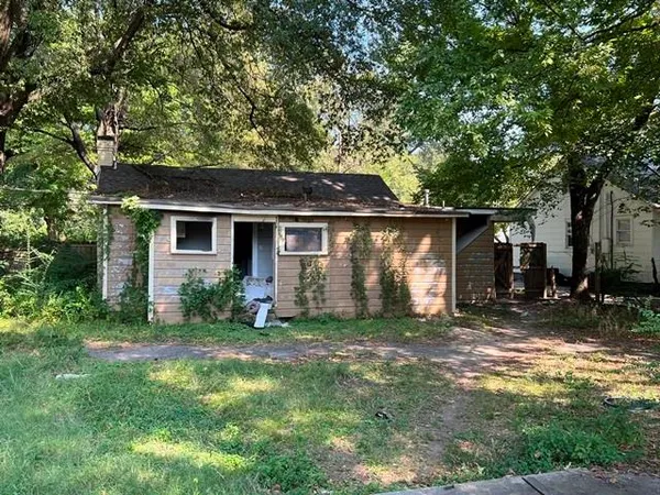 a view of a barn with a yard