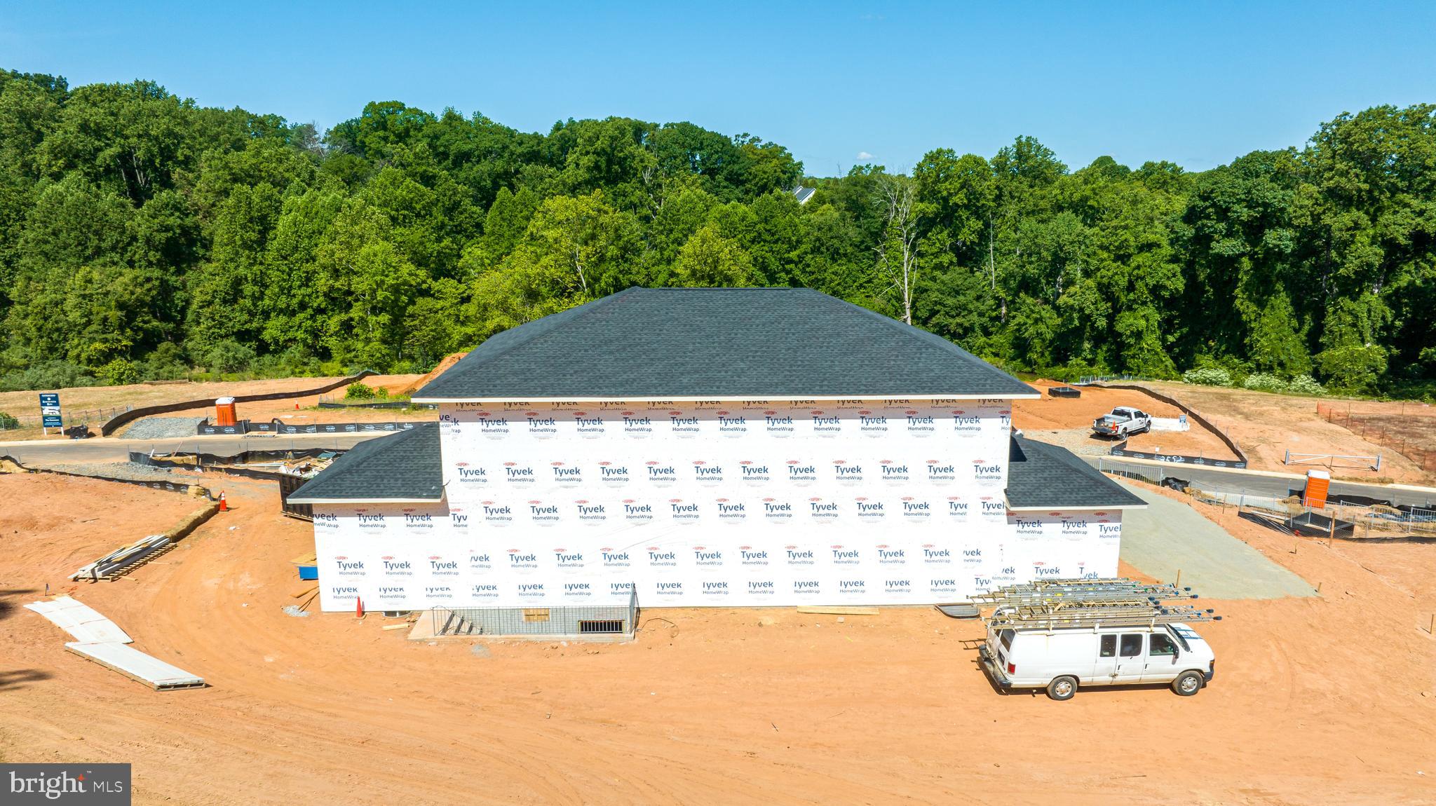 3557 Orchid Pond Way Oakton, VA 22124 - Photo 11 of 38 a view of multiple houses with yard