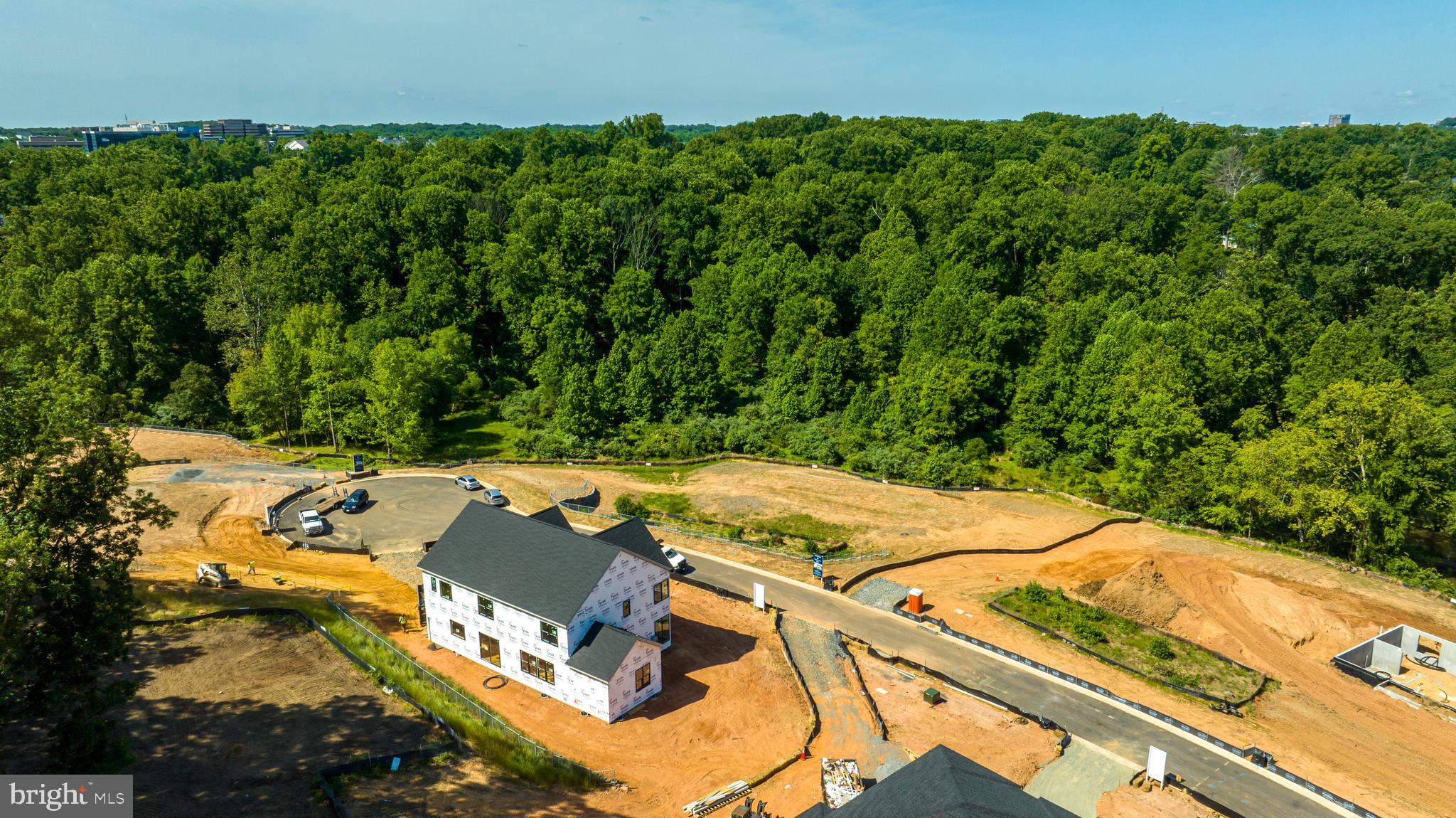 3557 Orchid Pond Way Oakton, VA 22124 - Photo 16 of 38 an aerial view of residential house with outdoor space and trees all around