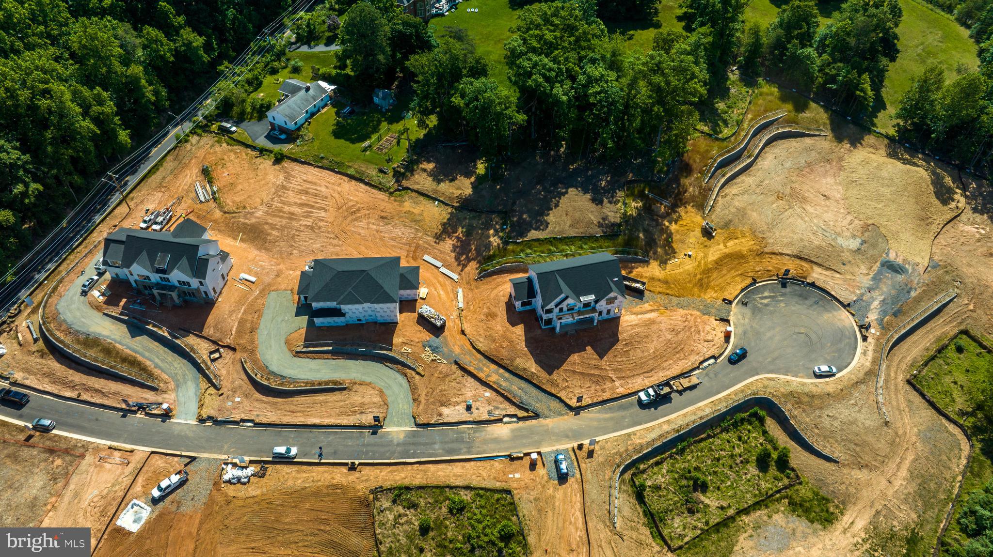 3557 Orchid Pond Way Oakton, VA 22124 - Photo 27 of 38 an aerial view of a residential houses with yard