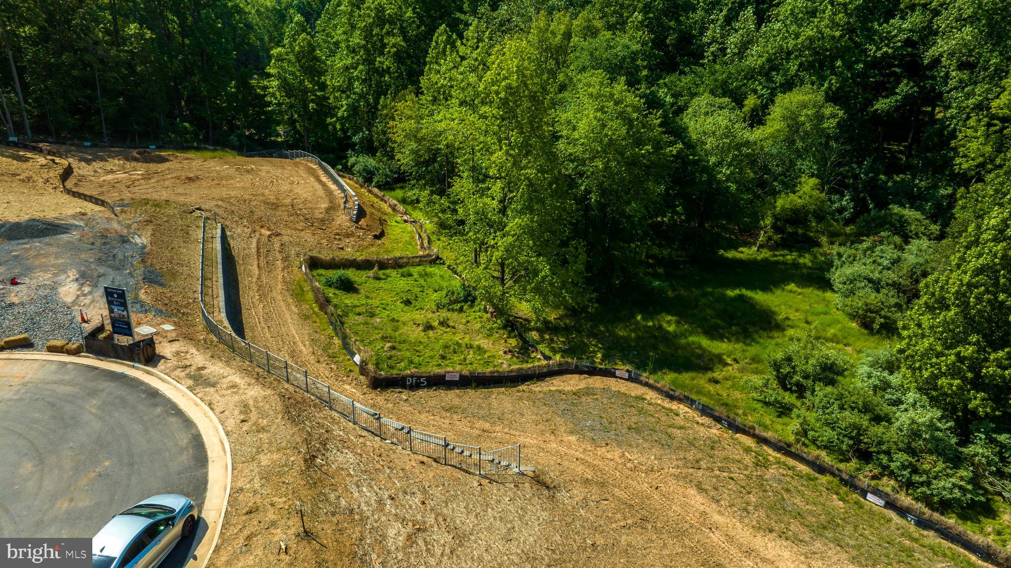 3557 Orchid Pond Way Oakton, VA 22124 - Photo 35 of 38 a view of a swimming pool with a yard