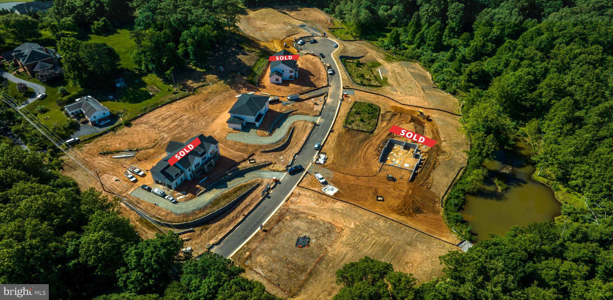 3557 Orchid Pond Way Oakton, VA 22124 - Photo 38 of 38 an aerial view of a house with swimming pool and outdoor seating