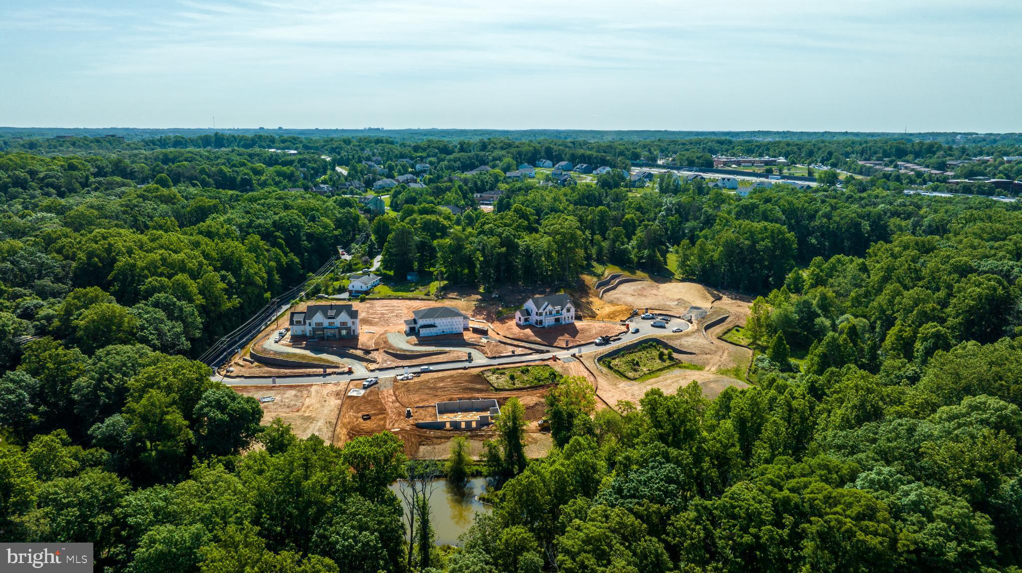 3557 Orchid Pond Way Oakton, VA 22124 - Photo 7 of 38 an aerial view of a house with yard swimming pool and outdoor seating
