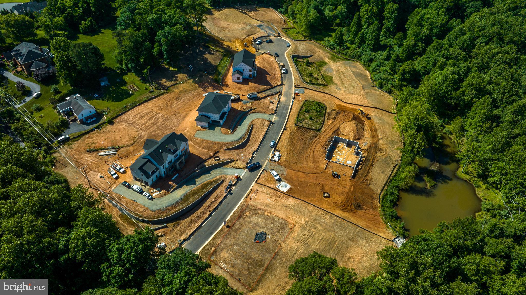 3557 Orchid Pond Way Oakton, VA 22124 - Photo 8 of 38 an aerial view of a residential houses with yard