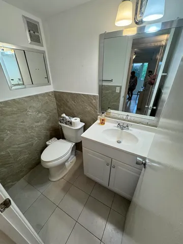 a room with window and walk in closet