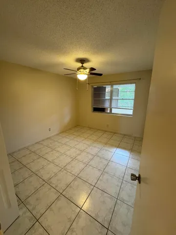 a view of walk in closet with window