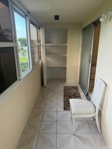 a view of a playground with a yard