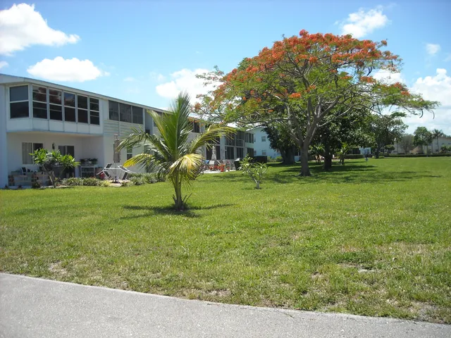 a room with lots of table and chairs