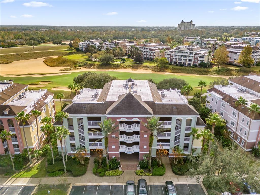 7612 Sandy Ridge Drive, Unit 304 Kissimmee, FL 34747 - Photo 1 of 1 a view of a city with an ocean view