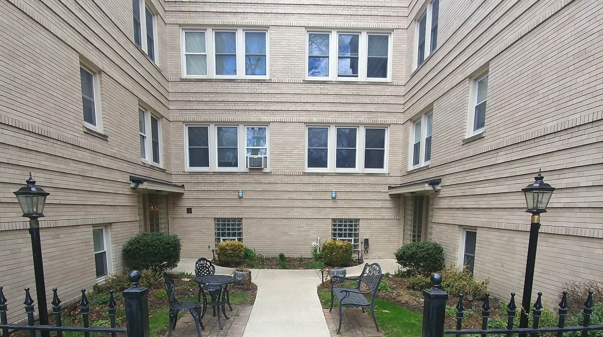 100 Pine Avenue, Unit 2 Riverside, IL 60546 - Photo 2 of 12 a view of a house with a patio