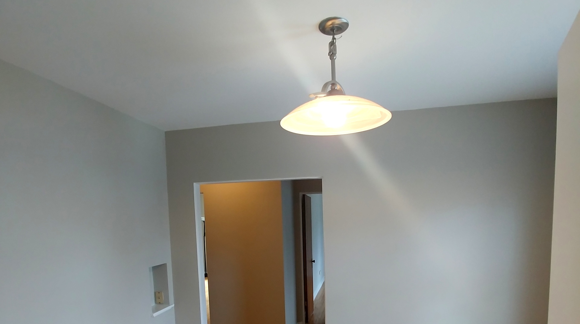 100 Pine Avenue, Unit 2 Riverside, IL 60546 - Photo 6 of 12 a view of a room with a sink wooden floor and a table