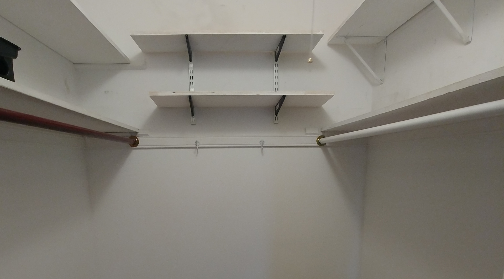 100 Pine Avenue, Unit 2 Riverside, IL 60546 - Photo 8 of 12 a view of a room with racks on the wall