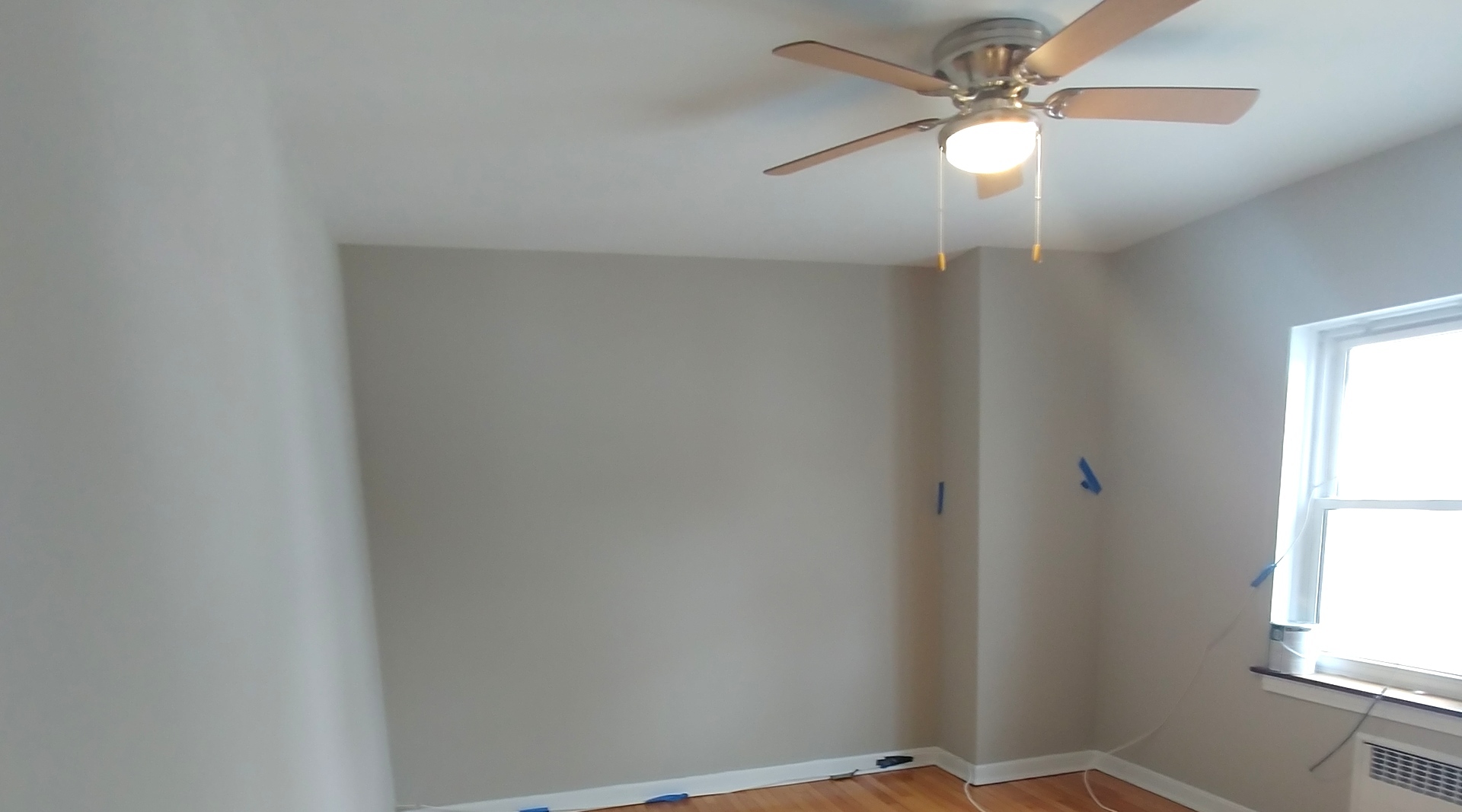 100 Pine Avenue, Unit 2 Riverside, IL 60546 - Photo 9 of 12 an empty room with windows and fan