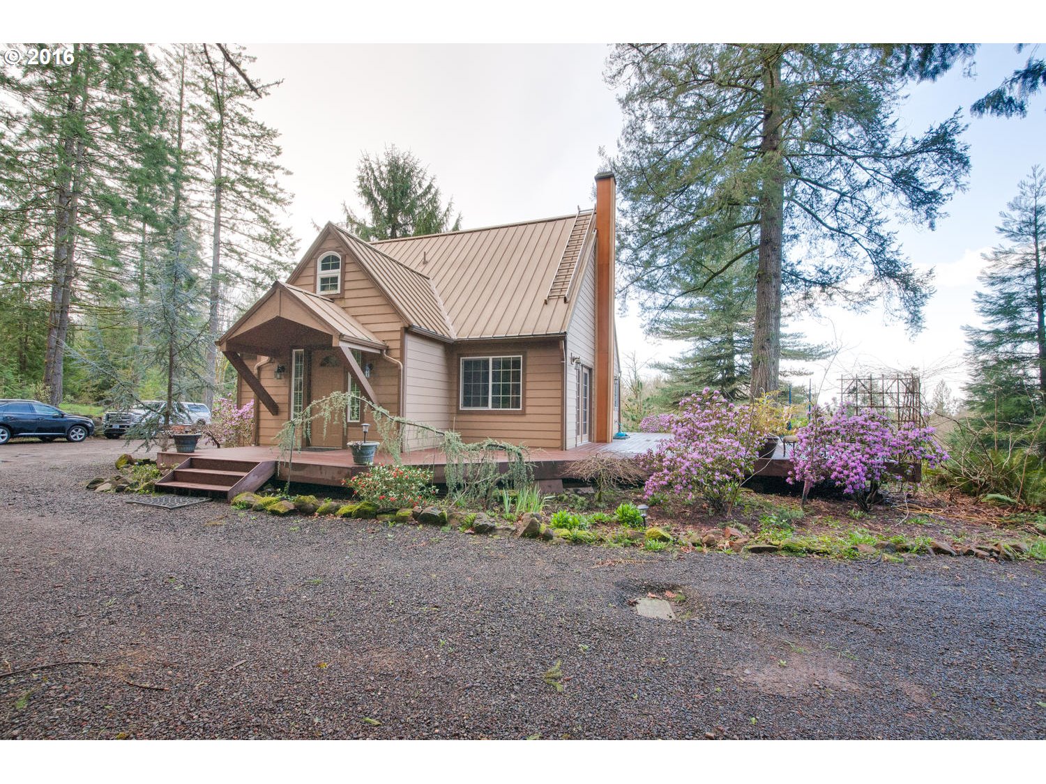 19966 South Moore Road Oregon City, OR 97045 - Photo 2 of 32 a view of a house with a yard and sitting area