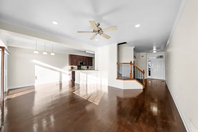 a view of a kitchen with a sink and a kitchen view