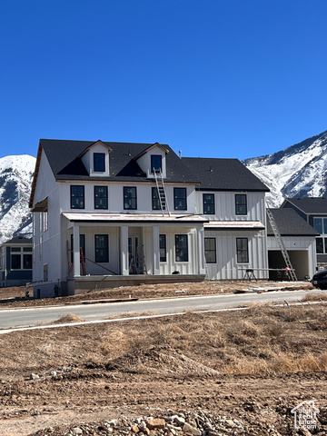 1242 North Luna Circle, Unit 26 Elk Ridge, UT 84651 - Photo 1 of 1 Modern inspired farmhouse featuring a porch and a mountain view