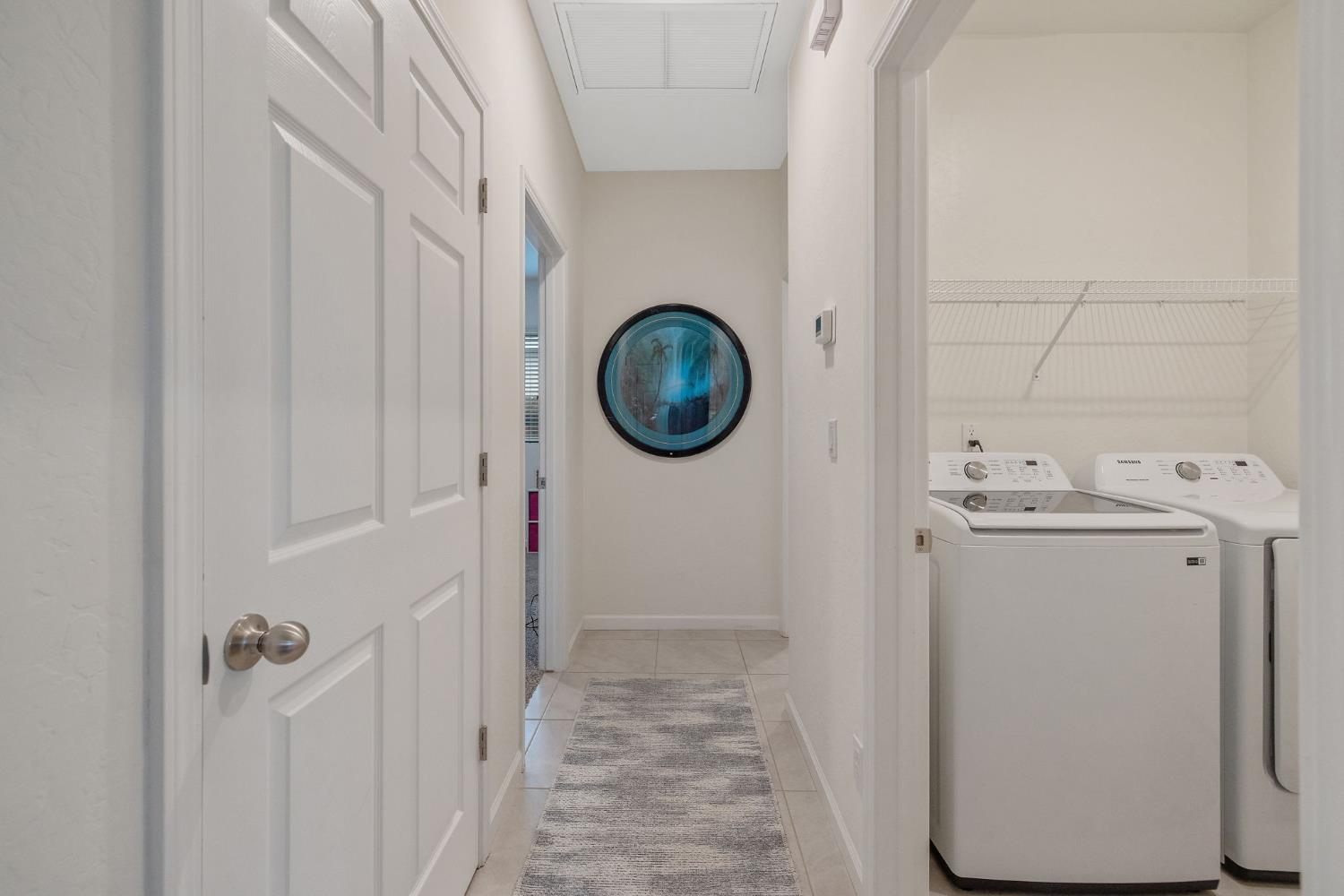 535 Sandtrap Lane Lemoore, CA 93245 - Photo 18 of 36 a bathroom with a sink and a mirror