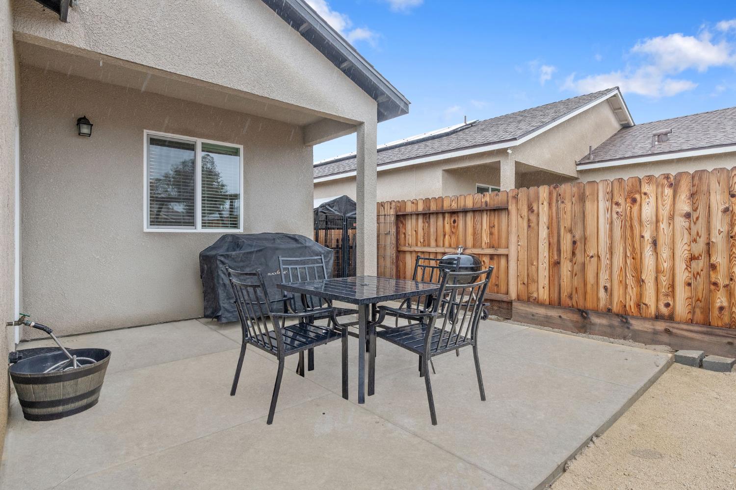 535 Sandtrap Lane Lemoore, CA 93245 - Photo 29 of 36 a view of a dining room with furniture and window
