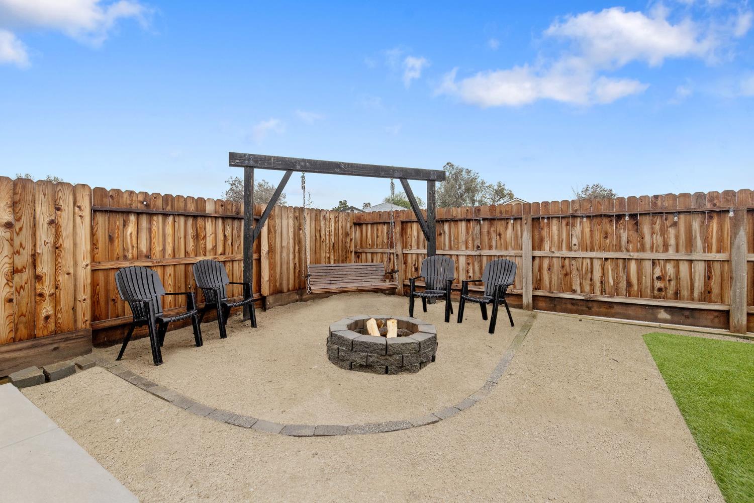 535 Sandtrap Lane Lemoore, CA 93245 - Photo 32 of 36 a view of a chairs and tables in the patio