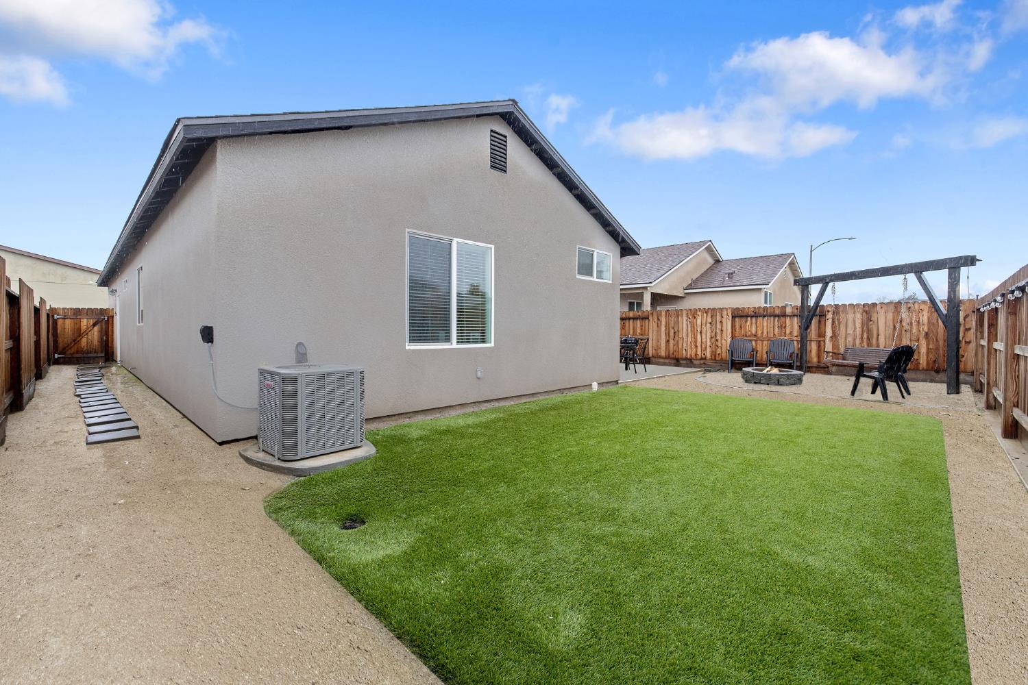 535 Sandtrap Lane Lemoore, CA 93245 - Photo 35 of 36 a view of a house with backyard and porch