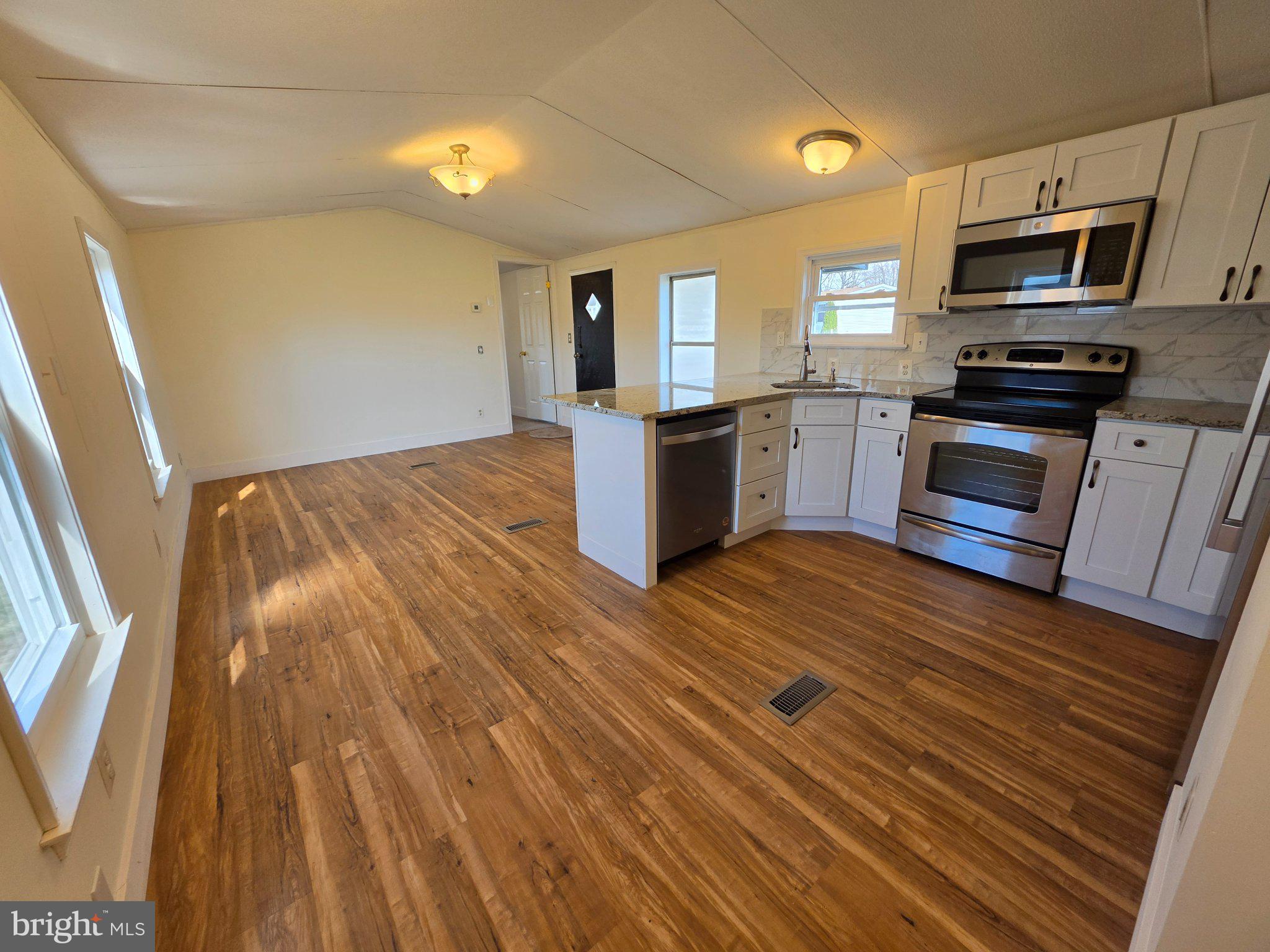 864 Aspen Avenue Spring City, PA 19475 - Photo 4 of 18 Bright, modern kitchen with open layout.