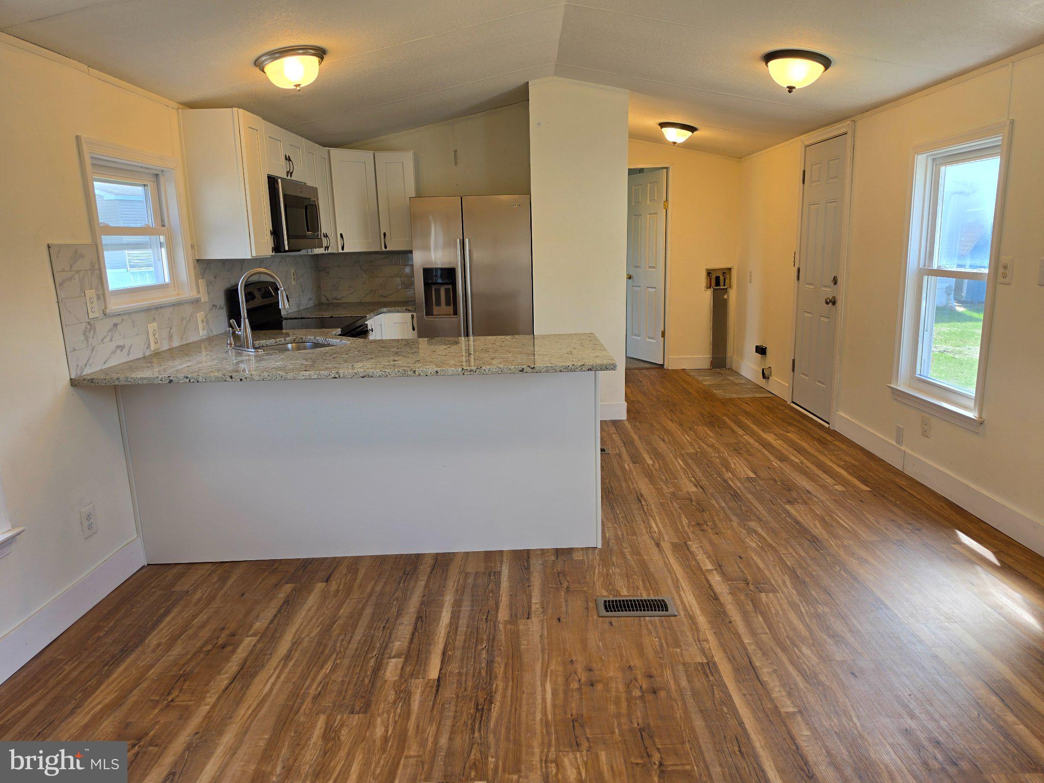 864 Aspen Avenue Spring City, PA 19475 - Photo 9 of 18 Bright, modern kitchen with open layout.