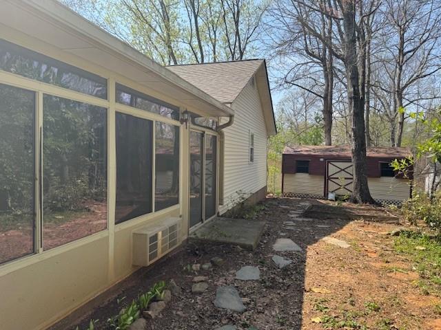 539 Faulkner Street Cleveland, GA 30528 - Photo 13 of 25 a view of a house with a yard and sitting area