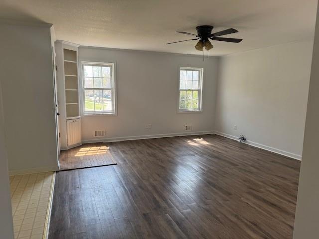 539 Faulkner Street Cleveland, GA 30528 - Photo 15 of 25 a view of empty room with wooden floor and fan