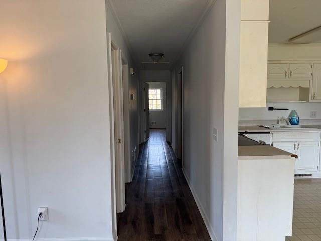 539 Faulkner Street Cleveland, GA 30528 - Photo 19 of 25 a view of a hallway with wooden floor and a kitchen