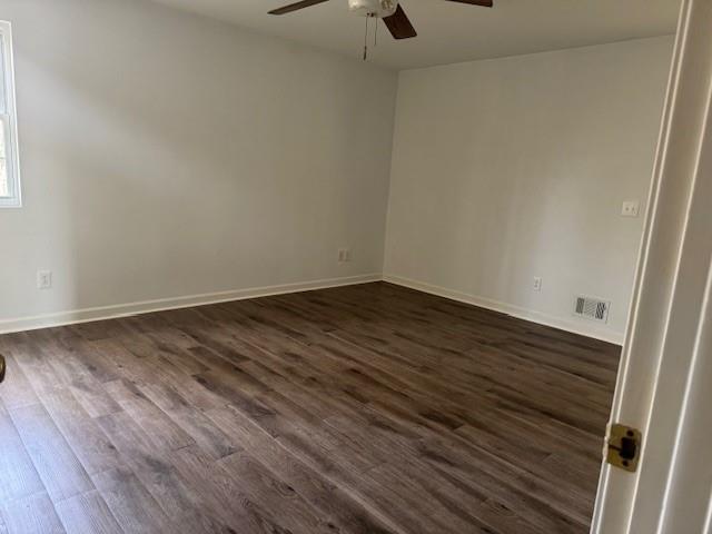 539 Faulkner Street Cleveland, GA 30528 - Photo 22 of 25 a view of room with wooden floor ceiling fan and window