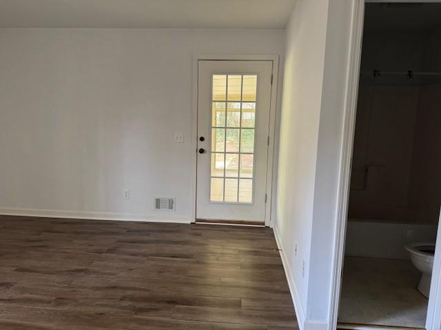 539 Faulkner Street Cleveland, GA 30528 - Photo 23 of 25 a view of an empty room with wooden floor and a window